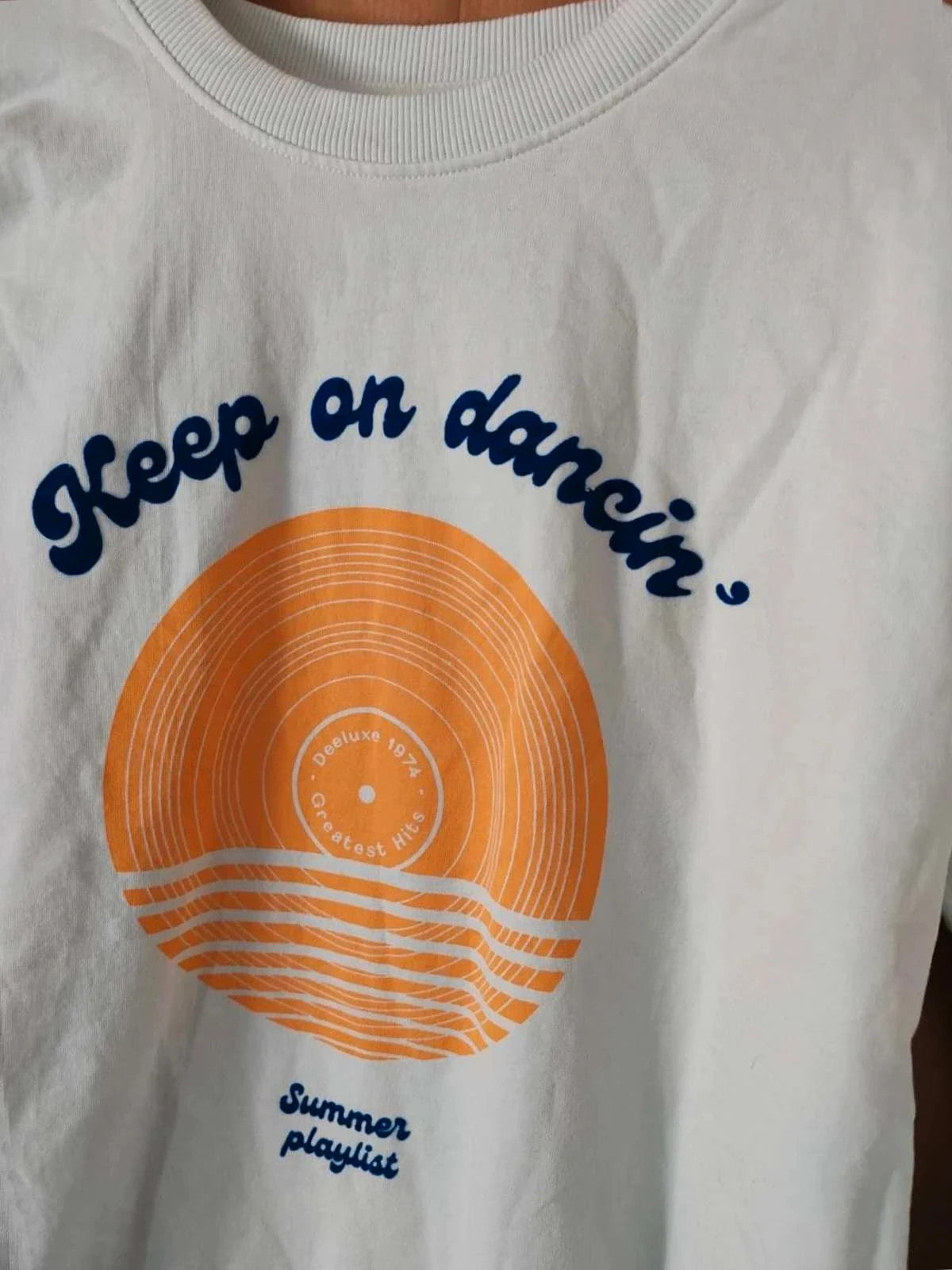 Sweat bleu/vert à motif