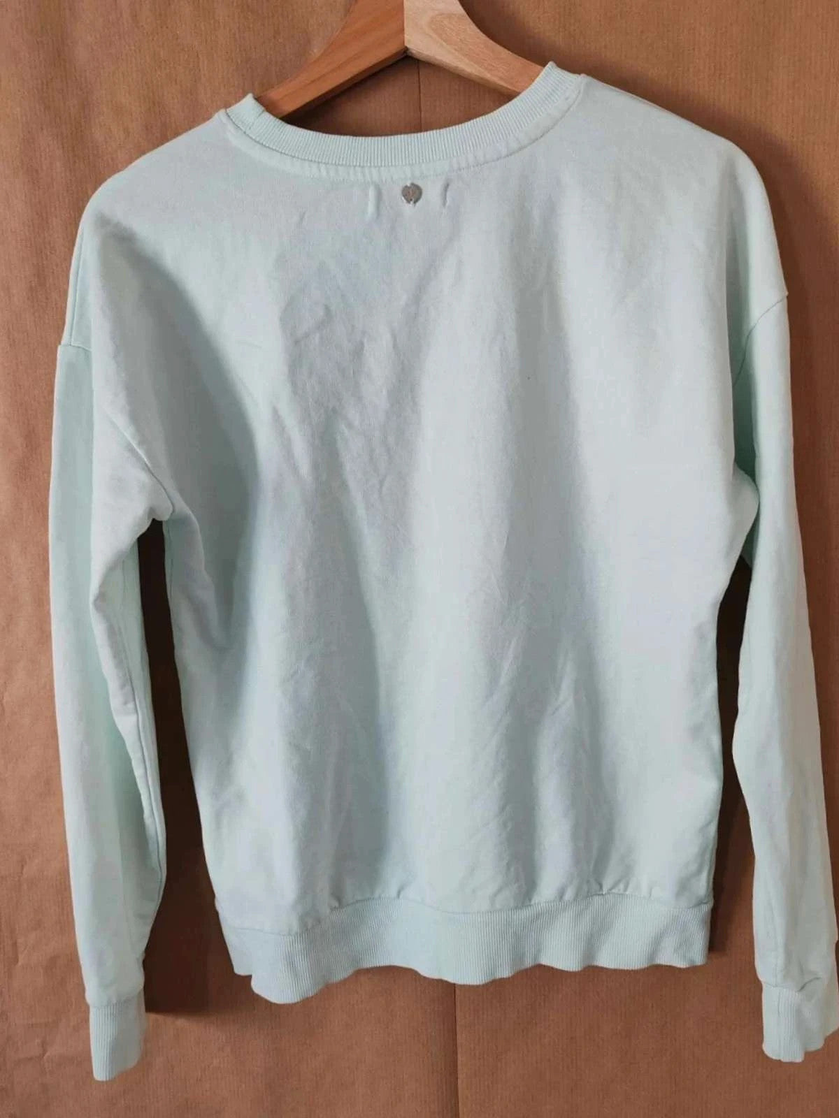 Sweat bleu/vert à motif