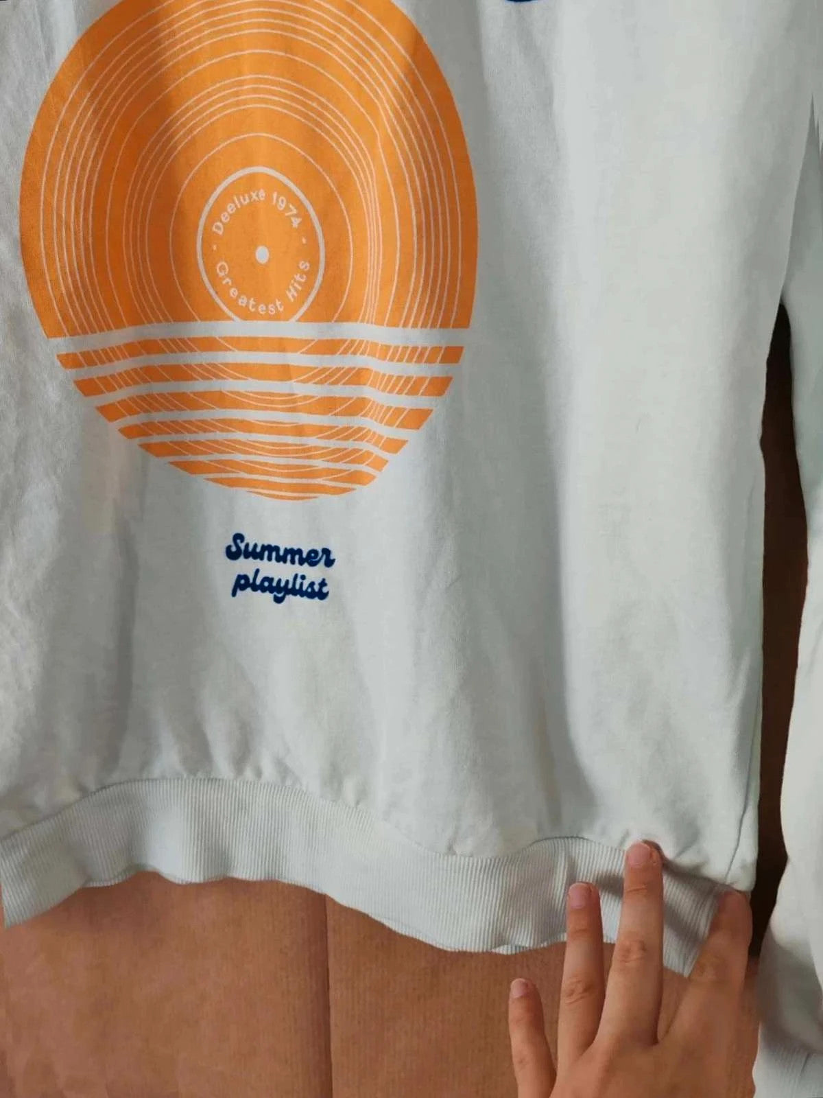 Sweat bleu/vert à motif