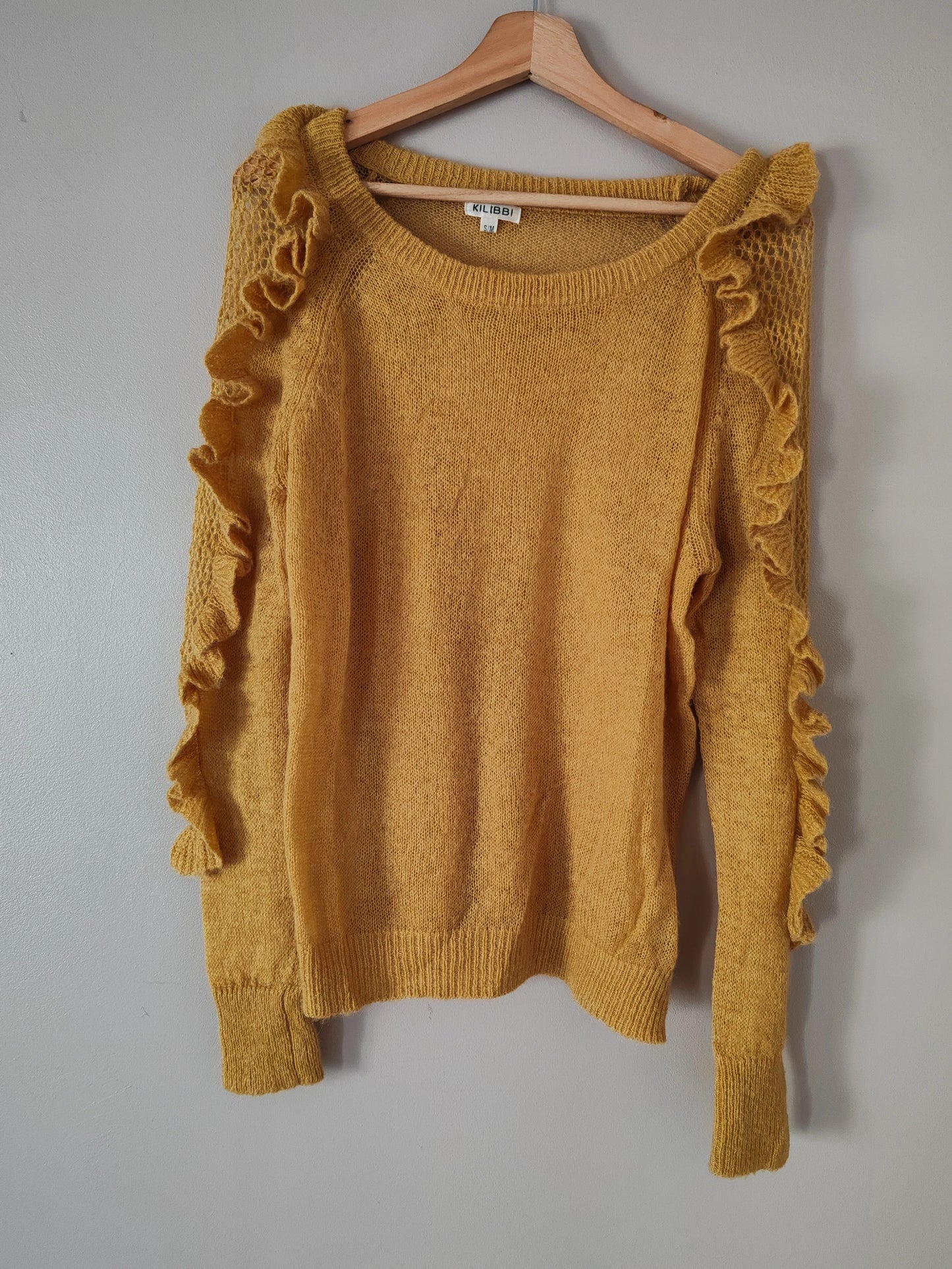 Pull moutarde volants taille S/M