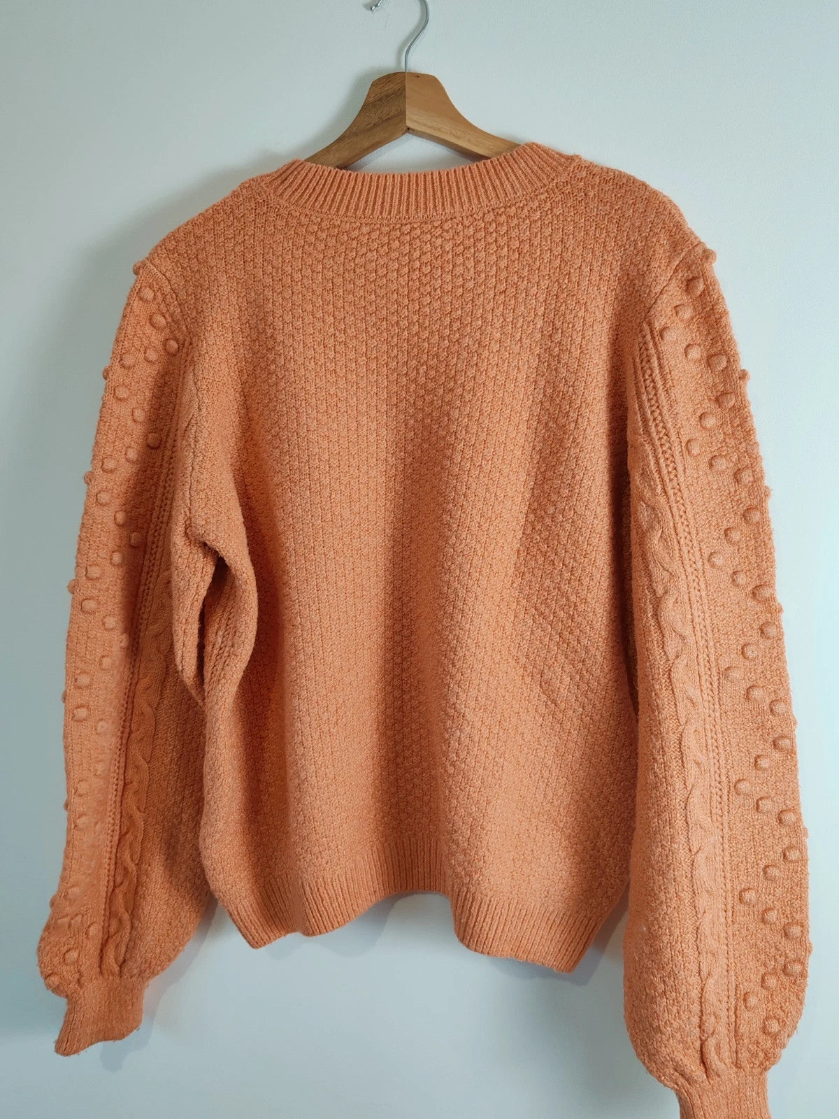 Pull pompons orange taille M