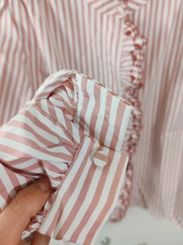 Blouse rayée rose taille L