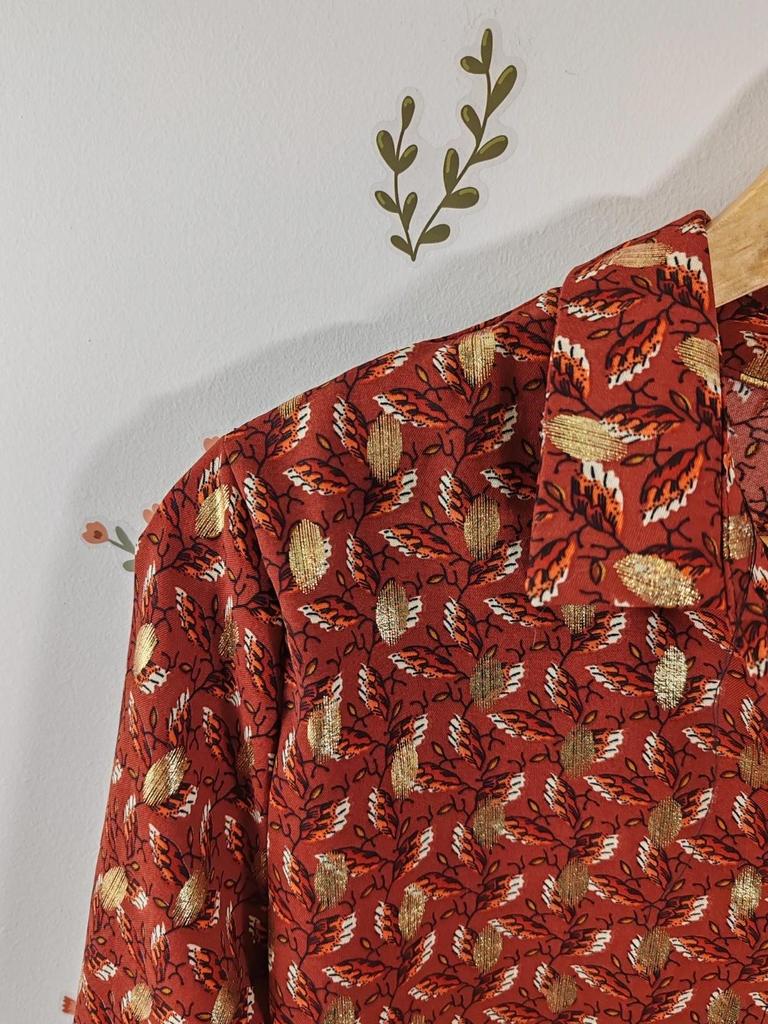 Blouse orangée et doré taille M