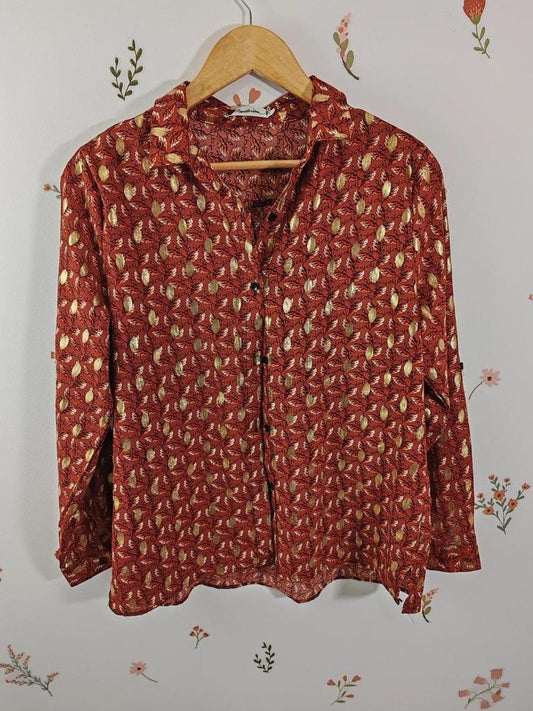 Blouse orangée et doré taille M